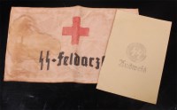 Lot 503 - A German SS Red Cross arm band and identity...