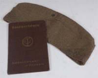 Lot 513 - A German RAD labour man's side cap, dated 1941,...