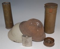 Lot 537 - A WW II French gas mask in original tin,...