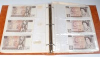 Lot 216 - A folder of approx 120 British banknotes to...