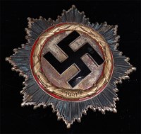 Lot 261 - A 1941 German Cross in silver of six rivet...