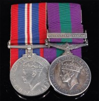 Lot 301 - A WW II War medal, together with Geo. VI...
