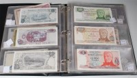 Lot 212 - A folder of approx 125 world banknotes to...