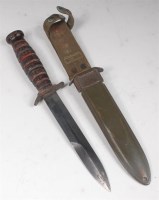 Lot 317 - A U.S. Army M3 trench knife, the 17cm double...