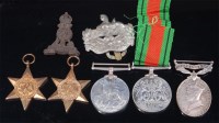 Lot 320 - A group of WW II medals to include 1939-45...