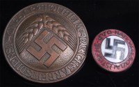 Lot 356 - A German RAD female leader's badge, together...