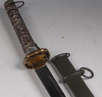 Lot 367 - A WW II Japanese shin gunto katana, having a...