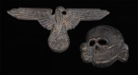 Lot 431 - A German Waffen SS eagle cap badge, together...