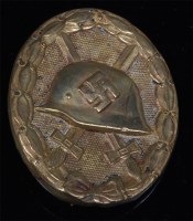 Lot 446 - A German Wound badge.