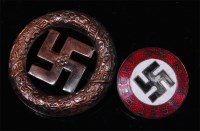 Lot 473 - A German NSDAP party members enamelled badge,...