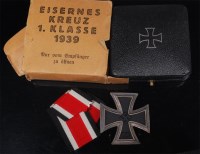 Lot 474 - A WW II German Iron Cross 1st class, boxed...