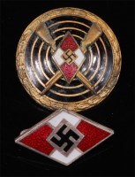 Lot 486 - A Hitler Youth red and white enamelled lapel...