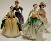 Lot 211 - Four Royal Doulton figurines to include;...