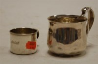 Lot 220 - A sterling silver christening mug, engraved...