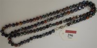 Lot 296 - A modern grey pearl ladies long necklace