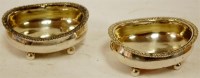 Lot 258 - A pair of George III silver open salts of oval...