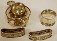 Lot 268 - A pair of sterling silver napkin rings, with...