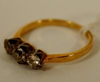 Lot 285 - A ladies 18ct gold diamond three stone ring