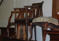 Lot 1101 - An Edwardian walnut tub elbow chair, together...