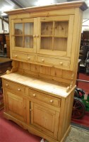 Lot 1120 - A Victorian style pine kitchen dresser, having...
