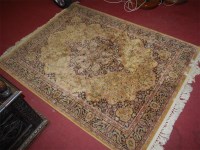 Lot 1126 - A Persian style machine woven yellow ground...
