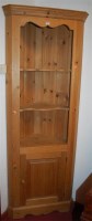 Lot 1134 - A modern pine part open freestanding corner...
