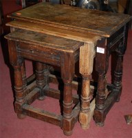 Lot 1433 - A joined and moulded oak nest of three...