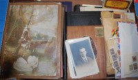 Lot 317 - An early 20th century postcard album and...