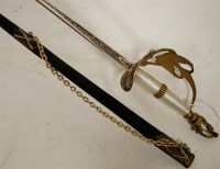 Lot 340 - A reproduction ceremonial sword in leather...