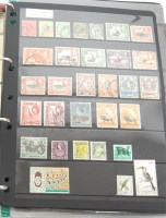 Lot 354 - A leather bound stamp album with contents to...