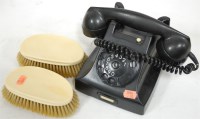 Lot 366 - An early 20th century bakelite telephone...