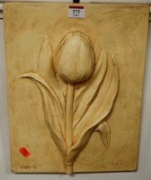 Lot 373 - A painted plaster relief plaque depicting a...