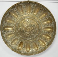 Lot 374 - An early 20th century eastern brass charger,...