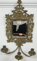 Lot 390 - An early 20th century pressed brass three...