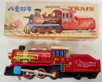 Lot 396 - A Chinese friction driven tinplate toy train,...