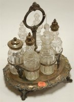 Lot 237 - A Victorian silver plated three bottle...