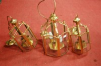 Lot 485 - A pair of brass framed and glass ceiling light...