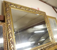 Lot 1012 - A reproduction gilt framed and bevelled...