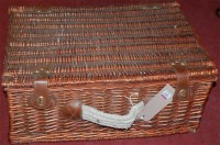 Lot 1067 - A wicker fitted picnic hamper