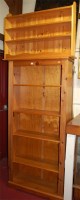 Lot 1081 - A modern pine freestanding open bookshelf,...