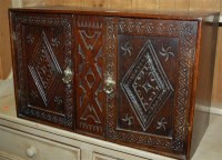 Lot 1083 - A Continental low relief carved oak double...