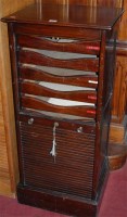 Lot 1089 - An early 20th century stained beech tambour...