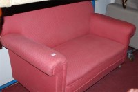 Lot 1142 - An Edwardian red upholstered two seater sofa