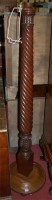 Lot 1161 - A mahogany spiral reeded standard lamp