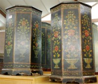 Lot 1166 - A pair of floral polychrome painted octagonal...