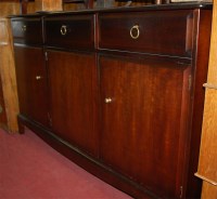 Lot 1181 - A Stag Minstrel three door sideboard, together...