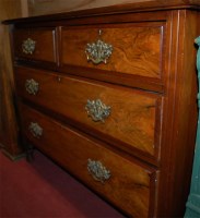 Lot 1194 - An Edwardian walnut chest of two short over...