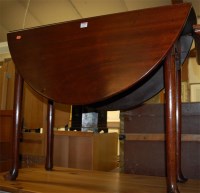 Lot 1197 - A George III mahogany dropleaf dining table, w....