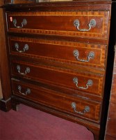 Lot 1201 - A reproduction mahogany chest of four long...
