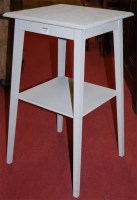 Lot 1215 - A painted two tier occasional table